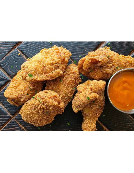 Frittura di pesce alla Louisiana, alette di pollo fritte piccanti